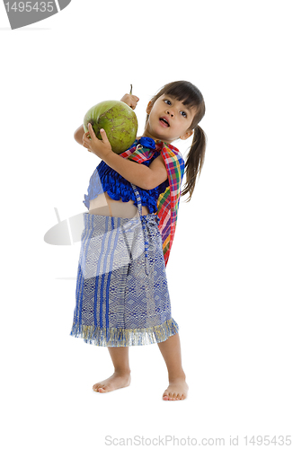 Image of sweet little girl with coconut