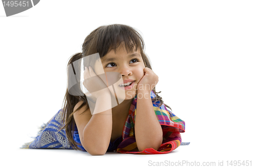 Image of cute little girl laying on the floor