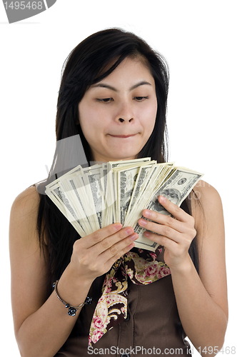 Image of pretty woman with lots of money