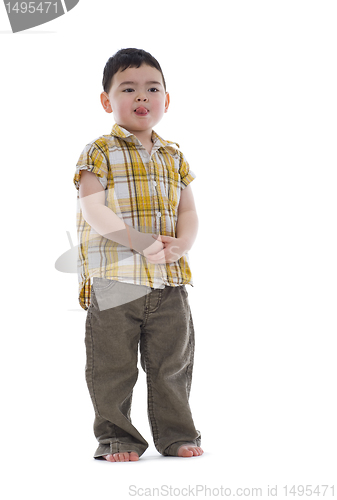 Image of cute kid sticking out his tongue
