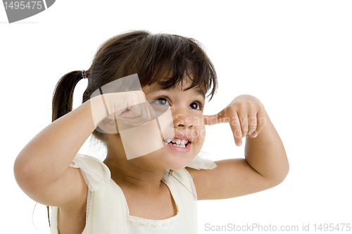 Image of cute happy girl looking up