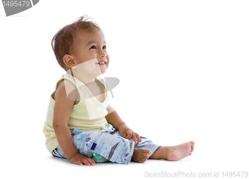 Image of little boy laughing and looking up