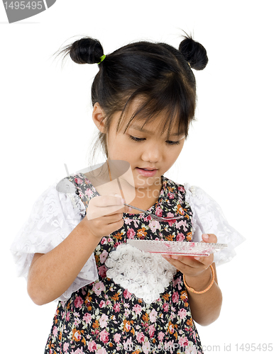 Image of little girl eating