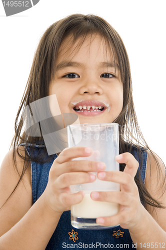 Image of girl with a glass of milk