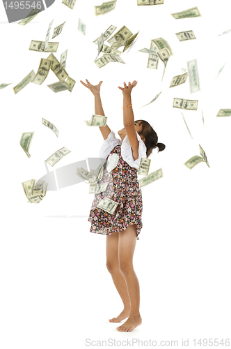 Image of pretty girl throwing money