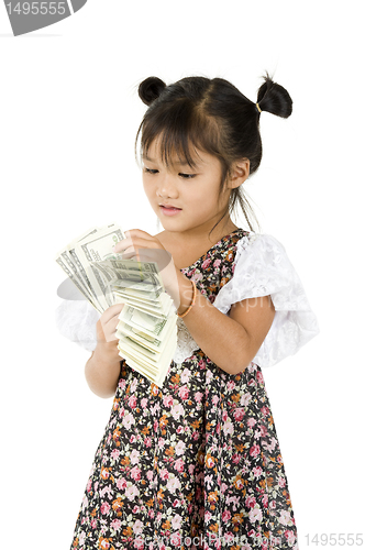 Image of little girl counting money