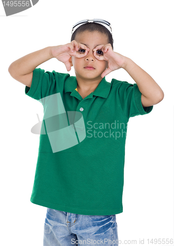Image of boy making glasses symbol