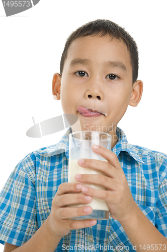 Image of boy enjoying milk