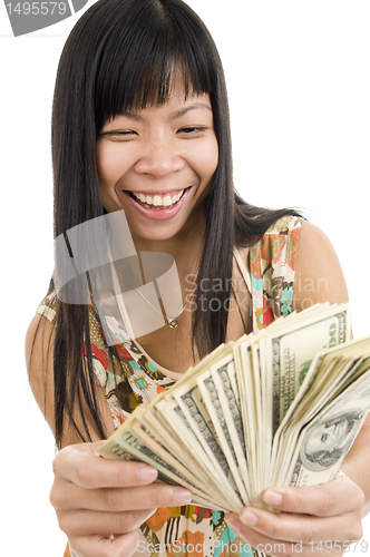 Image of happy woman with lots of money