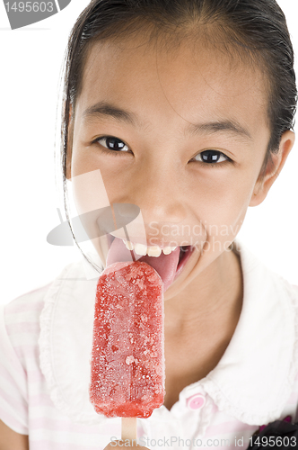 Image of happy girl licking ice cream