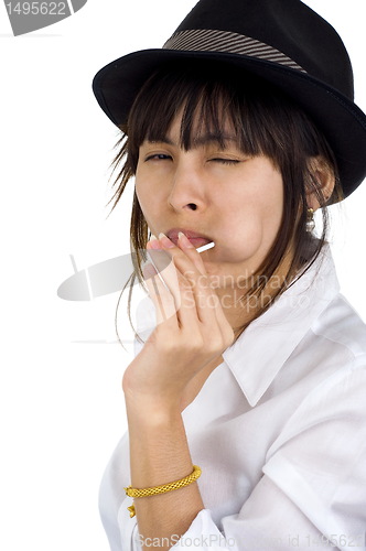 Image of young woman with lollipop