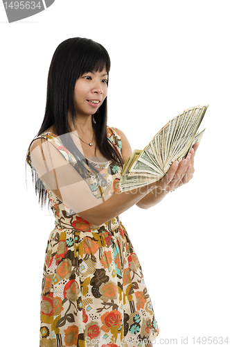 Image of woman starring at money