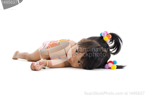 Image of cute little girl laying down