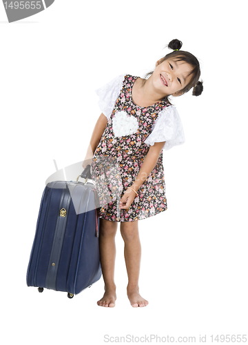 Image of happy Asian girl with heavy luggage