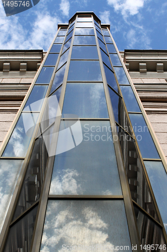 Image of reflection of sky in windows