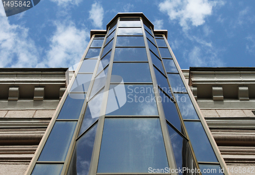 Image of reflection of sky in windows