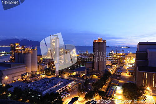 Image of cement factory at night