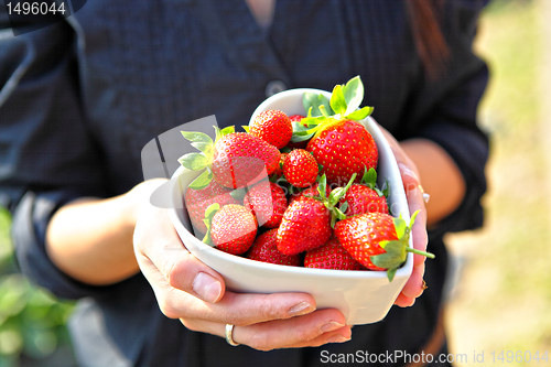 Image of strawberry in heart shape bowl