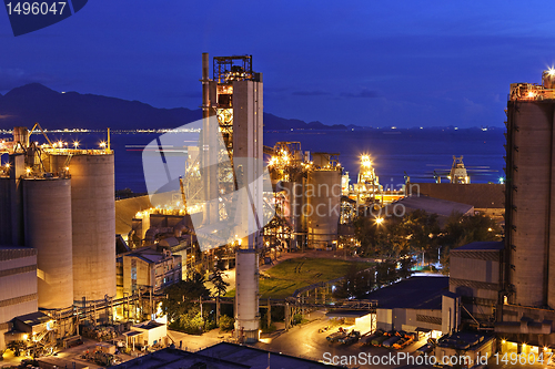 Image of cement factory at night