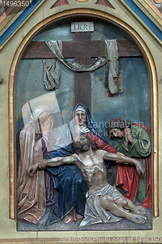 Image of 13th Stations of the Cross, Jesus' body is removed from the cross