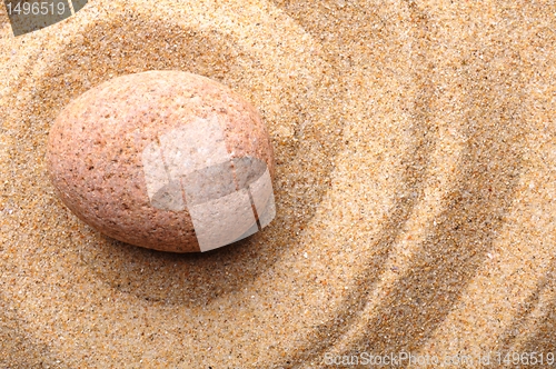 Image of zen stone with leaf