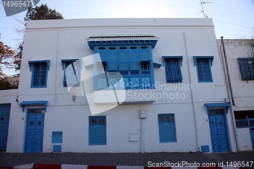 Image of Sidi Bou Said - typical building with white walls, blue doors and windows