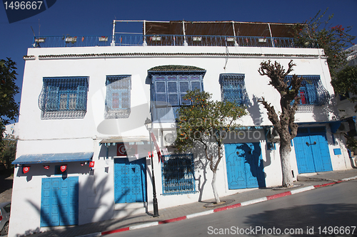 Image of Sidi Bou Said - typical building with white walls, blue doors and windows