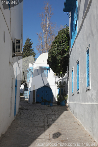 Image of Sidi Bou Said - typical building with white walls, blue doors and windows