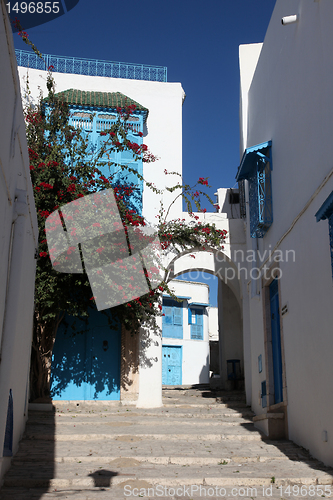 Image of Sidi Bou Said - typical building with white walls, blue doors and windows