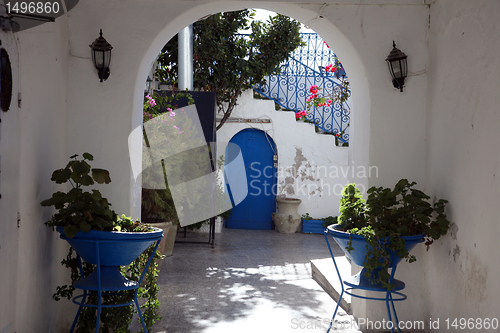 Image of Sidi Bou Said - typical building with white walls, blue doors and windows