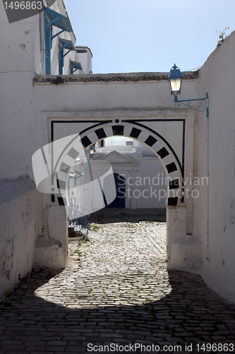 Image of Sidi Bou Said - typical building with white walls, blue doors and windows