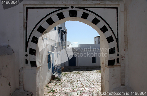 Image of Sidi Bou Said - typical building with white walls, blue doors and windows