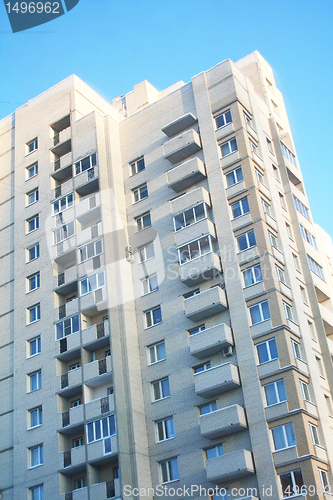 Image of High apartment building on a blue sky 