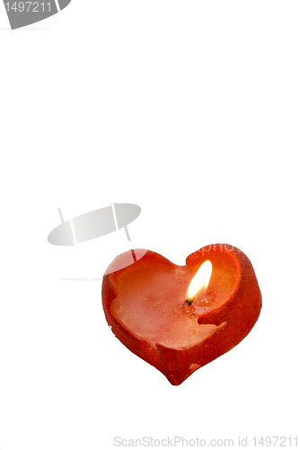 Image of Burning heart shaped candle 