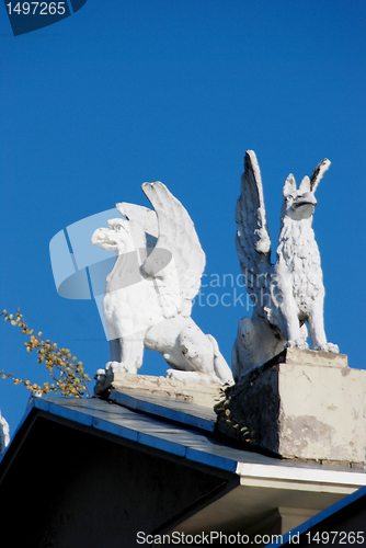 Image of Two griffin sculptures 