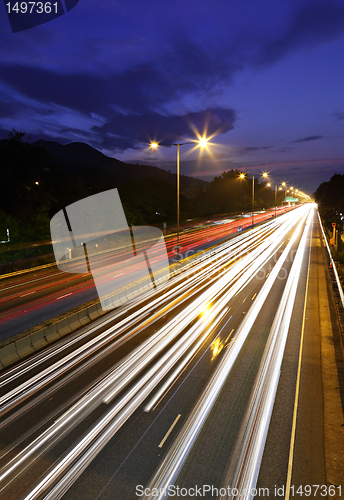 Image of traffic on highway at night