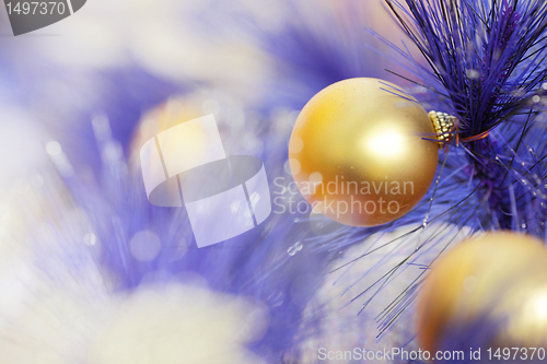 Image of christmas ball on blue color christmas tree