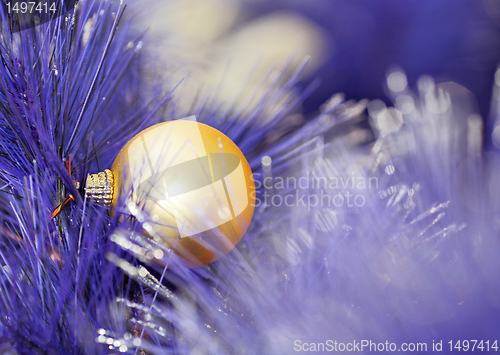 Image of christmas ball on blue color christmas tree