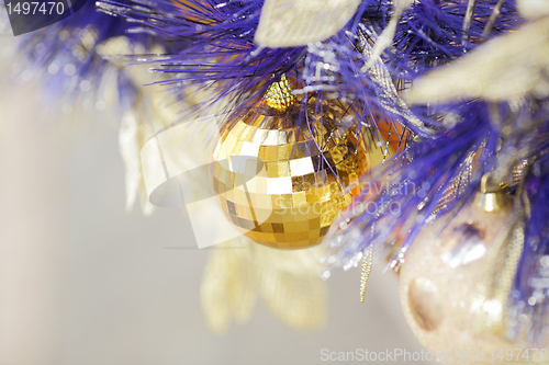 Image of christmas ball on blue color christmas tree
