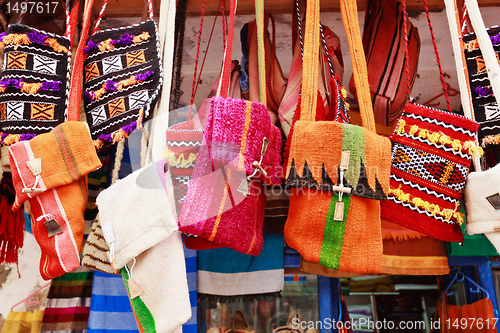 Image of Colorful bags in a market in the street