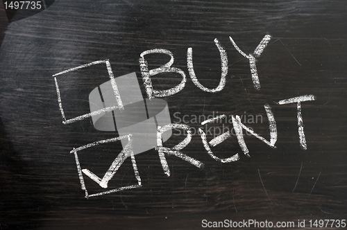 Image of Buy or sell check boxes on blackboard