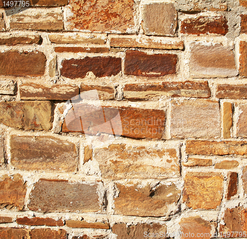 Image of Abstract old colorful stone wall as background 