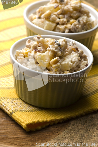 Image of Salad with corn, ananas, nuts and rice