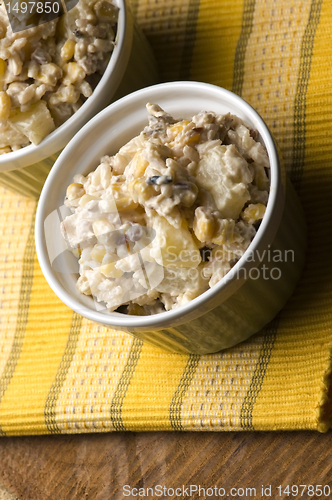 Image of Salad with corn, ananas, nuts and rice