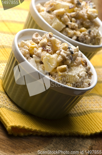 Image of Salad with corn, ananas, nuts and rice