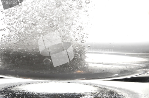 Image of tablet in glass water