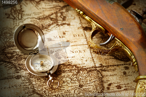 Image of 	old compass on vintage map