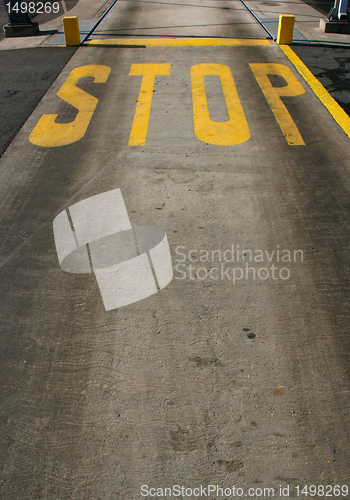 Image of Yellow stop sign