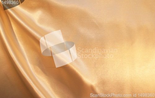 Image of Smooth elegant golden silk as background