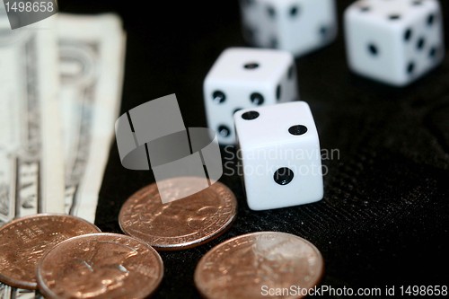 Image of Gambling dice and money